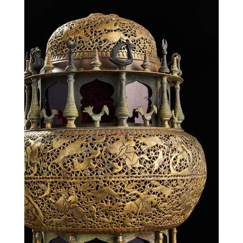 248 - AN ENGRAVED OPEDWORK QAJAR BRASS LAMP, 19TH CENRY  A19th-century brass lamp from the Qajar period, D... 