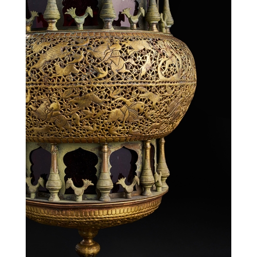 248 - AN ENGRAVED OPEDWORK QAJAR BRASS LAMP, 19TH CENRY  A19th-century brass lamp from the Qajar period, D... 