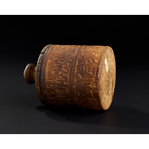 251 - A RARE EARLY ISLAMIC ENGRAVED WOODEN CYLINDRICAL CONTAINER WITH KUFIC CALLIGRAPHY, PERSIA OR SYRIA, ... 