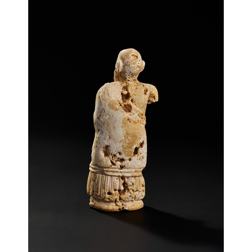 26 - ANCIENT SUMERIAN WHITE STONE STATUE, CIRCA 2500 B.C. A Sumerian white stone statue, dating to circa ... 