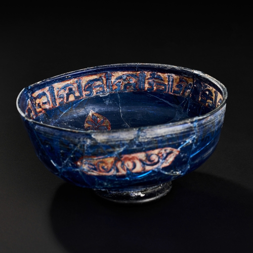 270 - A RARE MAMLUK ENAMELLED BLUE GLASS BOWL, 13TH -14TH CENTURY  A RARE MAMLUK ENAMELLED BLUE GLASS BOWL... 