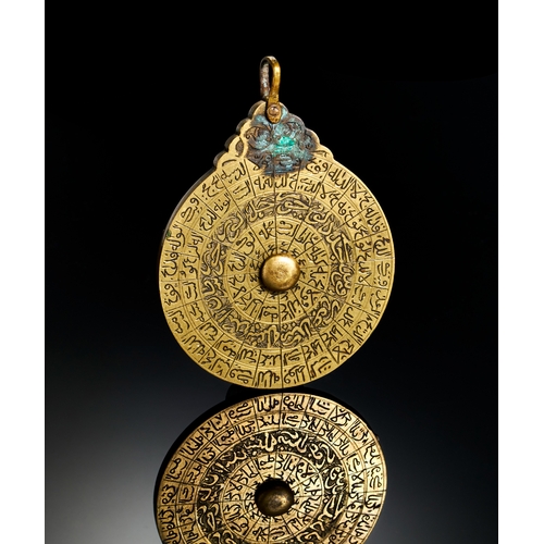 321 - A FINE ENGRAVED QAJAR BRASS MINIATURE ASTROLABE, 19TH CENTURY  A 19th-century brass miniature astrol... 