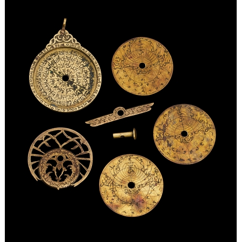 321 - A FINE ENGRAVED QAJAR BRASS MINIATURE ASTROLABE, 19TH CENTURY  A 19th-century brass miniature astrol... 