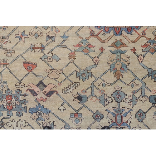 348 - A RARE AND LARGE ANTIQUE SERAPI RUG, 567 X 345cm A rare to find Serapi with the cream ground with an... 