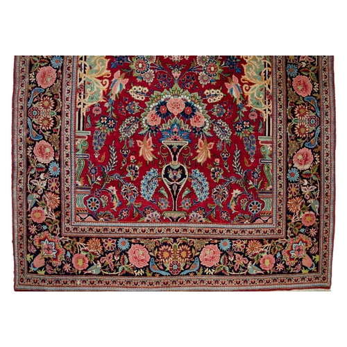 351 - ANTIQUE WOOL KASHAN RUG, 206 X 135CM  A picture of a building in the centre of the piece within a ro... 