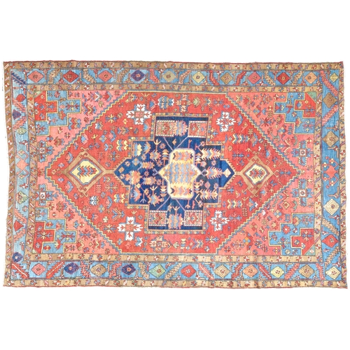 354 - ANTIQUE WOOL HERIZ KARAJA CARPET, 398 X 299 CM Terracotta ground colour has a wonderful harmony with... 