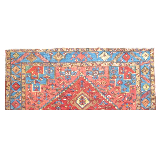 354 - ANTIQUE WOOL HERIZ KARAJA CARPET, 398 X 299 CM Terracotta ground colour has a wonderful harmony with... 