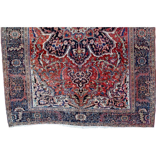 360 - LARGE ANTIQUE HERIZ CARPET, 351 X 250CM  Bold Heriz medallion on a soft red ground with stylish leav... 