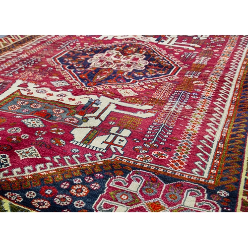 366 - VINTAGE QASHQAI RUG, 234 X 153CM  Charming vintage Qashqai rug featuring two large horses with beaut... 