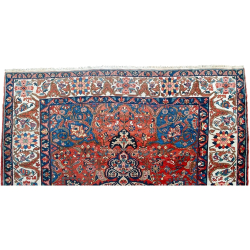 370 - A LARGE ANTIQUE BAKHTIAR CARPET, 420 X 326CM A striking Bakhtiar medallion on a rich terracotta back... 