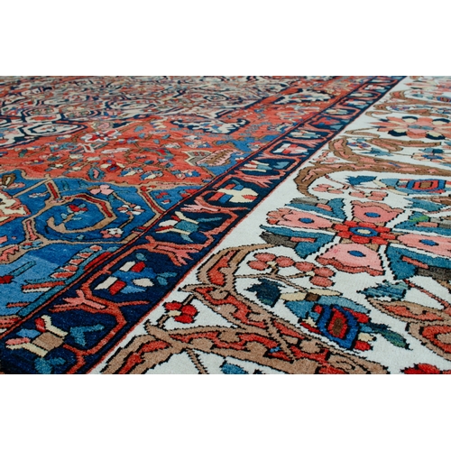 370 - A LARGE ANTIQUE BAKHTIAR CARPET, 420 X 326CM A striking Bakhtiar medallion on a rich terracotta back... 