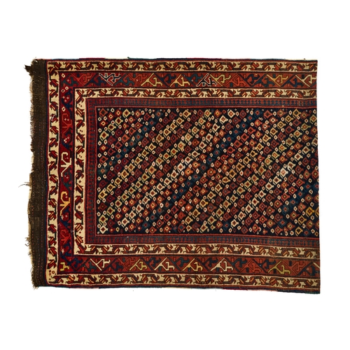 373 - A LARGE TRIBLE CAUCASIAN WOOL CARPET A LARGE TRIBLE CAUCASIAN WOOL CARPET