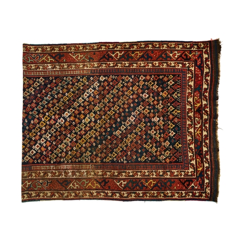 373 - A LARGE TRIBLE CAUCASIAN WOOL CARPET A LARGE TRIBLE CAUCASIAN WOOL CARPET