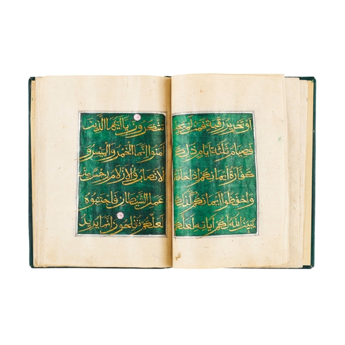 82 - AN ILLUMINATED CHINESE QURAN SECTION JUZ SIGNED AND DATED, 18TH CENTURY  An illuminated Quran sectio... 