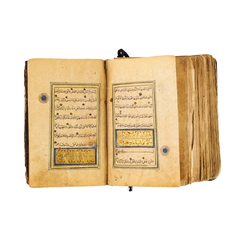 83 - AN ILLUMINATED TIMURID QURAN, PERSIA, 15TH CENTURY  A rare and beautifully illuminated Quran manuscr... 