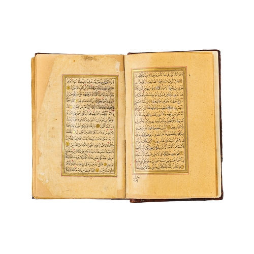 89 - AN ILLUMINTAED OTTOMAN QURAN SIGNED YAHYA HELMY AND DATED AH 1289/ 1873 A.D. AN ILLUMINTAED OTTOMAN ... 