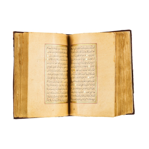 89 - AN ILLUMINTAED OTTOMAN QURAN SIGNED YAHYA HELMY AND DATED AH 1289/ 1873 A.D. AN ILLUMINTAED OTTOMAN ... 