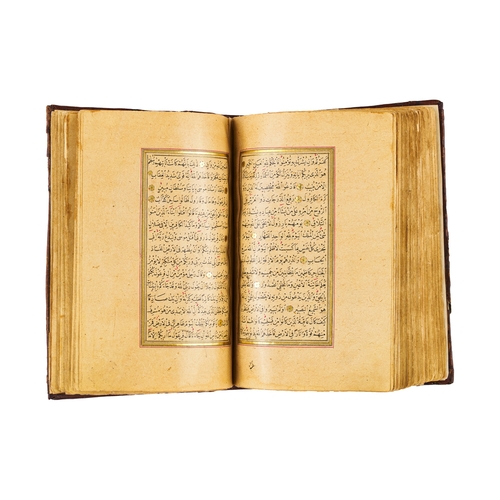 89 - AN ILLUMINTAED OTTOMAN QURAN SIGNED YAHYA HELMY AND DATED AH 1289/ 1873 A.D. AN ILLUMINTAED OTTOMAN ... 