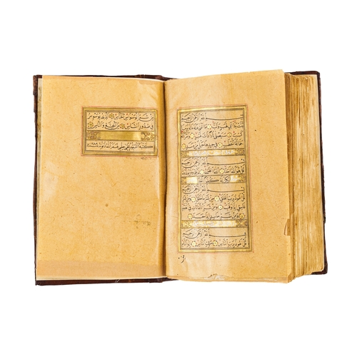 89 - AN ILLUMINTAED OTTOMAN QURAN SIGNED YAHYA HELMY AND DATED AH 1289/ 1873 A.D. AN ILLUMINTAED OTTOMAN ... 