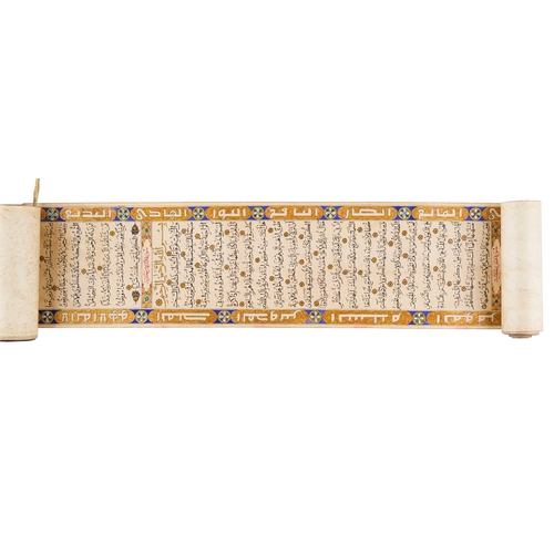 93 - AN ILLUMINATED QURAN SCROLL DATED 1323 HIJRI SIGNED ABDULHAMID BAK BIN SHAKIR ALZAHRANI ALHUMSY An i... 