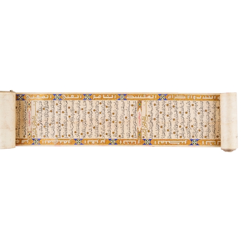 93 - AN ILLUMINATED QURAN SCROLL DATED 1323 HIJRI SIGNED ABDULHAMID BAK BIN SHAKIR ALZAHRANI ALHUMSY An i... 