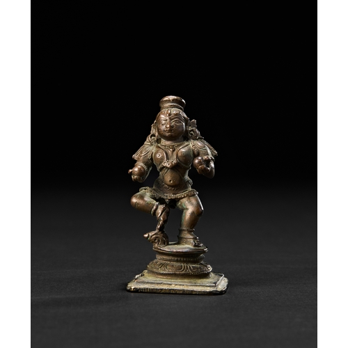 196 - A SOUTH INDIAN BRONZE FIGURE OF KRISHNA THE BUTTER THIEF, 18TH CENTURYDepicted as a lively, childlik... 