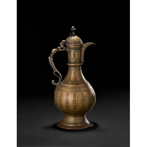 207 - A BRASS ENGRAVED EWER SIGNED BY MASTER AHMED, CENTRAL ASIAN BUKHARA, 19TH CENTURYThe vessel features... 