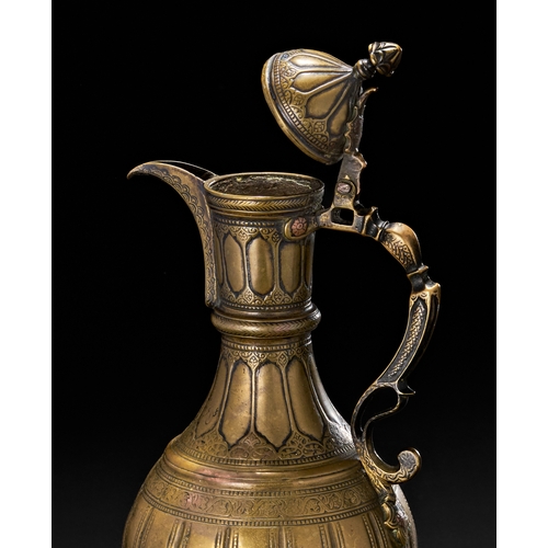 207 - A BRASS ENGRAVED EWER SIGNED BY MASTER AHMED, CENTRAL ASIAN BUKHARA, 19TH CENTURYThe vessel features... 
