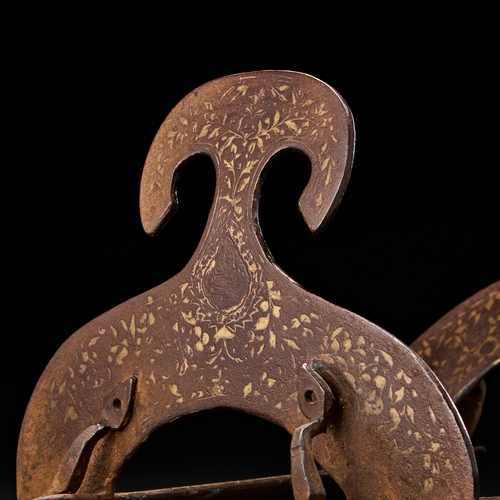 219 - A RARE INDO PERSIAN SILVER INLAID IRON SADDLE, 19TH CENTURYFeatures a distinctively arched seat and ... 