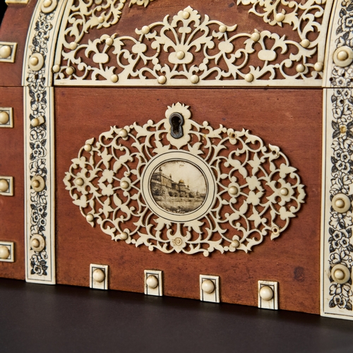220 - AN ANGLO INDIAN VIZAGAPATAM IVORY OVERLAID SANDALWOOD DOMED CASKET, 19TH CENTURYWith a rounded lid, ... 