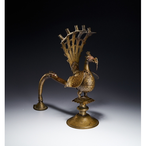 101 - A BRONZE INCENSE BURNER IN THE FORM OF A PEACOCK, INDIA DECCAN, 16TH CENTURY Constructed with a hing... 