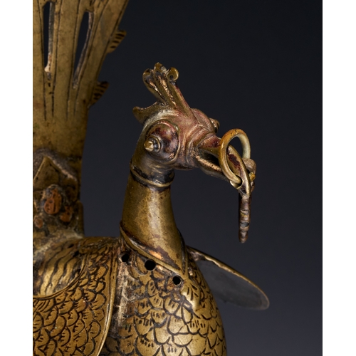 101 - A BRONZE INCENSE BURNER IN THE FORM OF A PEACOCK, INDIA DECCAN, 16TH CENTURY Constructed with a hing... 