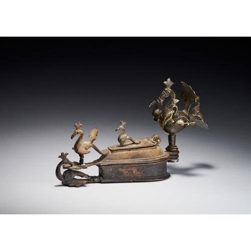 105 - A BRONZE PEACOCK KUMKUM TIKKA SPIRITUAL BOX, DECCAN INDIA, 17TH CENTURY This bronze ritual container... 