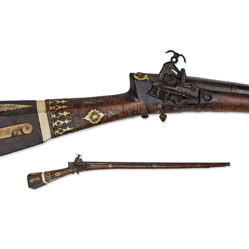 108 - AN OTTOMAN MIQUELET-LOCK TUFEK RIFLE, TURKEY, 18TH - 19TH CENTURY This Ottoman Moroccan miquelet-loc... 