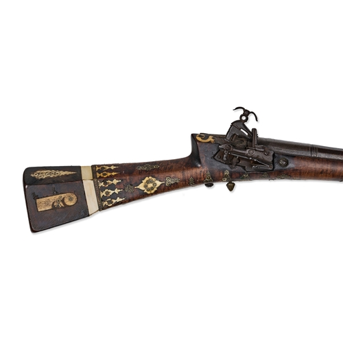 108 - AN OTTOMAN MIQUELET-LOCK TUFEK RIFLE, TURKEY, 18TH - 19TH CENTURY This Ottoman Moroccan miquelet-loc... 