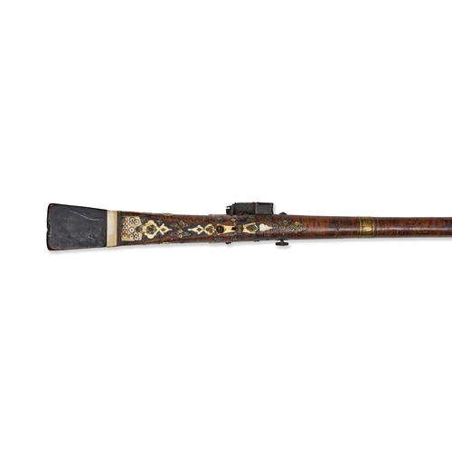 108 - AN OTTOMAN MIQUELET-LOCK TUFEK RIFLE, TURKEY, 18TH - 19TH CENTURY This Ottoman Moroccan miquelet-loc... 
