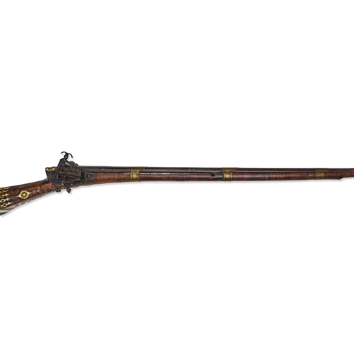 108 - AN OTTOMAN MIQUELET-LOCK TUFEK RIFLE, TURKEY, 18TH - 19TH CENTURY This Ottoman Moroccan miquelet-loc... 