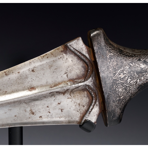 115 - AN INDIAN STEEL DAGGER KHANJAR DAGGER WITH SILVER KOFTGARI INLAY, 19TH CENTURY The double-edged blad... 