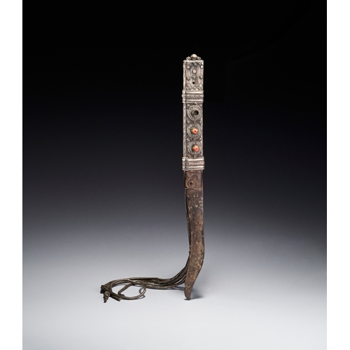 118 - A BEDOUIN SHIBRIYA DAGGER WITH FILIGREE WHITE METAL AND CORAL BEADS, 19TH CENTURY This antique Bedou... 