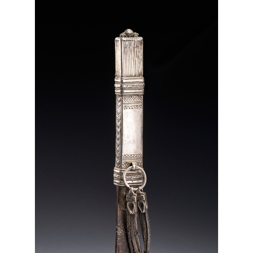 118 - A BEDOUIN SHIBRIYA DAGGER WITH FILIGREE WHITE METAL AND CORAL BEADS, 19TH CENTURY This antique Bedou... 