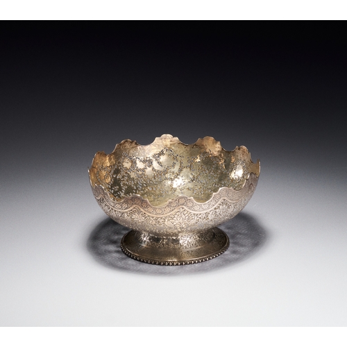130 - A PERSIAN SILVER PIERCED AND CHASED FOOTED BOWL SIGNED BY MASTER JAAFAR, 19TH CENTURY This Persian s... 