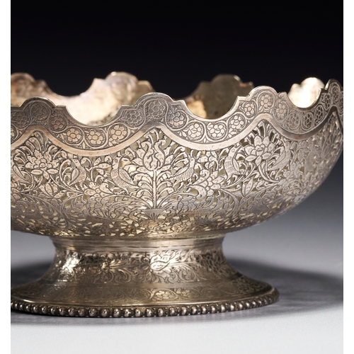 130 - A PERSIAN SILVER PIERCED AND CHASED FOOTED BOWL SIGNED BY MASTER JAAFAR, 19TH CENTURY This Persian s... 