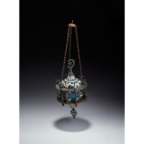 141 - AN ENAMELED AND PIERCED METAL HANGING MOSQUE LAMP, SYRIA, 19TH CENTURY This hanging mosque lamp is a... 