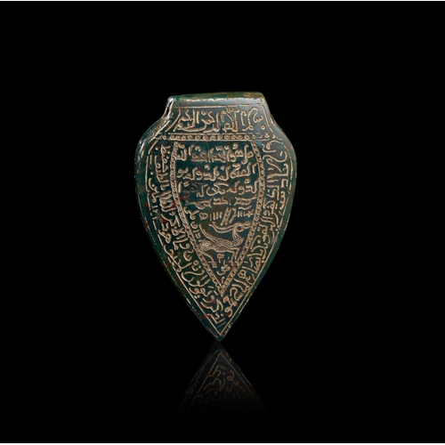 144 - AN INSCRIBED SUFI BLOODSTONE TALISMANIC AMULET PENDANT, IRAN, 18TH-19TH CENTURY A carved bloodstone ... 