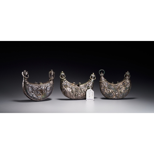 61 - A THREE SELJUK SILVER AND NIELLO PECTORAL AMULET CASES, IRAN, CIRCA 12TH CENTURY Comprising three cr... 