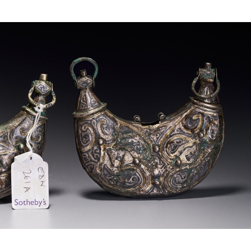 61 - A THREE SELJUK SILVER AND NIELLO PECTORAL AMULET CASES, IRAN, CIRCA 12TH CENTURY Comprising three cr... 