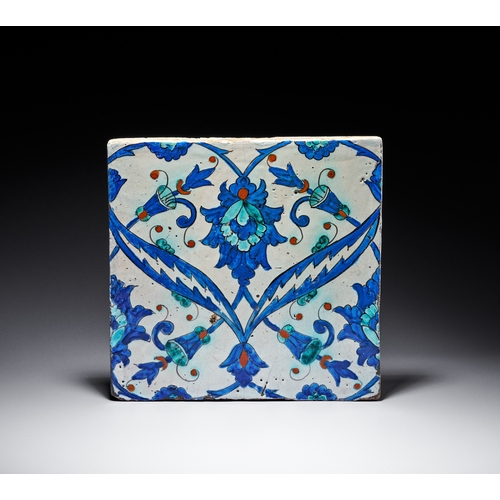 65 - AN IZNIK POTTERY TILE, OTTOMAN TURKEY, CIRCA 1580 The central composition features a large lobed pal... 