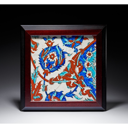 66 - AN IZNIK-STYLE POLYCHROME FRITWARE POTTERY TILE WITH FLORAL AND SAZ LEAF DECORATION, TURKEY, 19TH CE... 