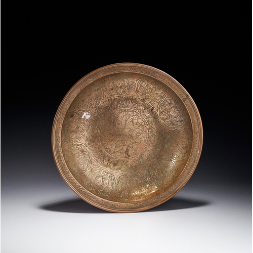 77 - A COPPER BOWL WITH FISH MOTIFS, DECCAN INDIA, 17TH - 18TH CENTURY The interior surface is densely de... 