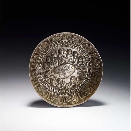 85 - AN OTTOMAN BALKAN REPOUSSE SILVER BOWL DEPICTING THE LAST SUPPER, 18TH CENTURY A silver bowl of circ... 